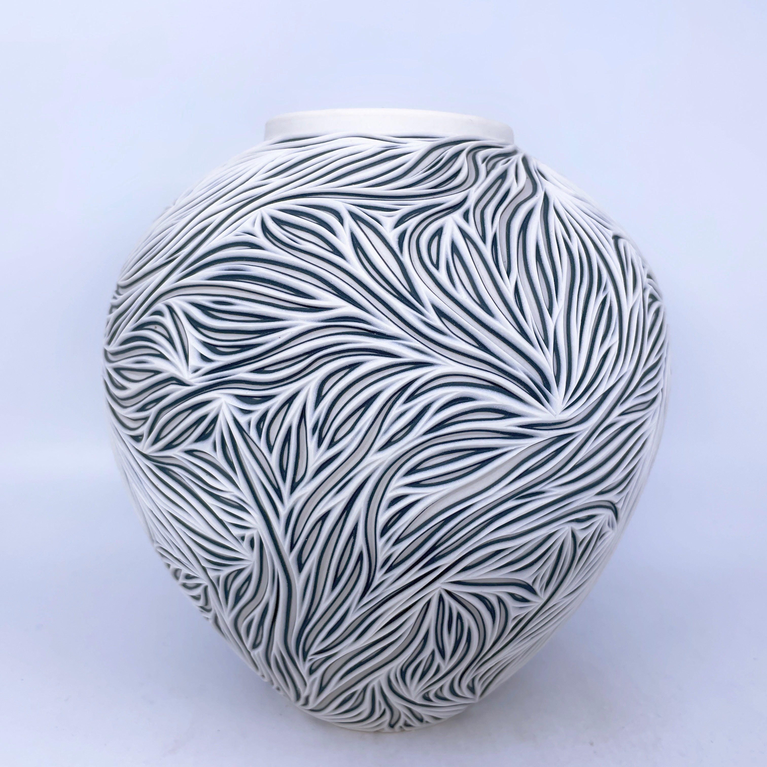 Large Intricate Carved Vase Black and white
