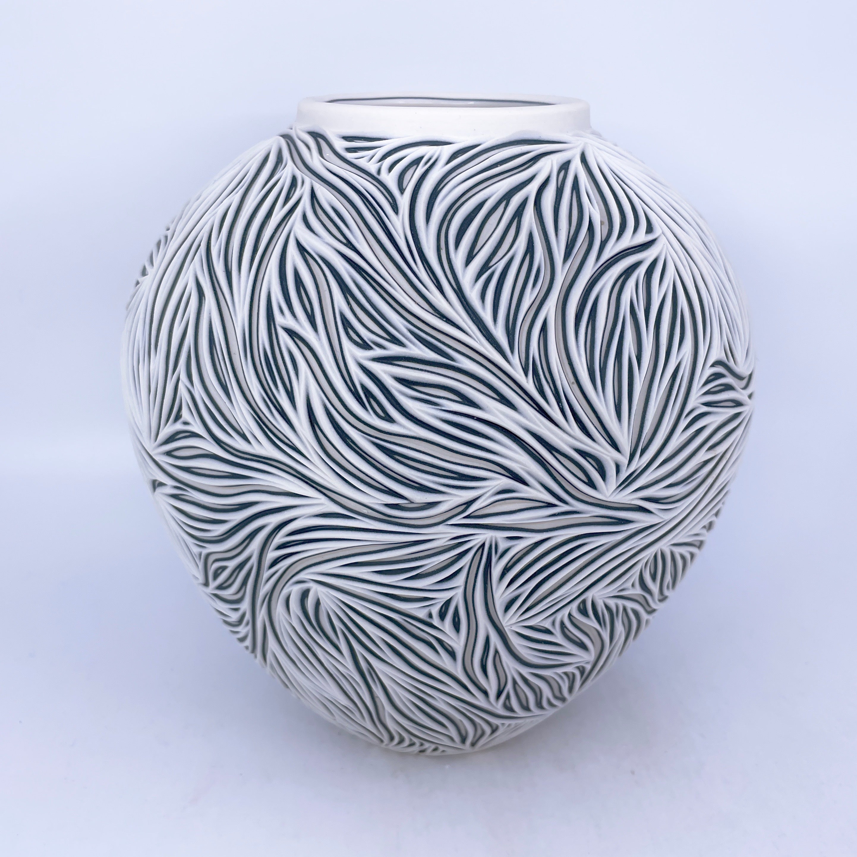 Large Intricate Carved Vase Black and white